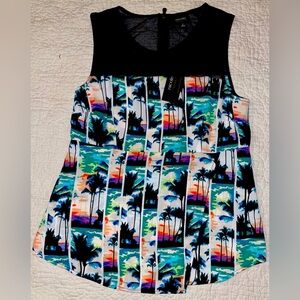 Nicole Miller, Tropical Palm Print. Front has a flap for extra room.